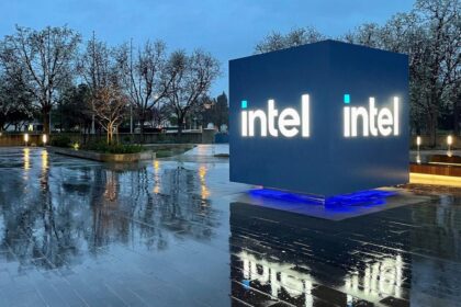 Intel Headquarters Robert Noyce Building in Santa Clara, California at night with Intel sign lit up.