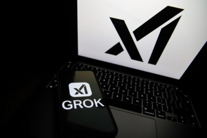 The Grok logo appears on a phone and the xAI logo is displayed on a laptop.